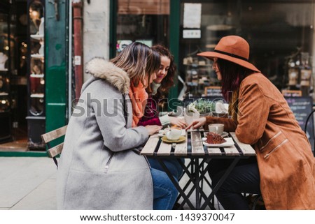 Similar – Foto Bild Drei glückliche Freunde bei der Besichtigung der Brücke von Porto bei Sonnenuntergang. Reisen, Freundschaft und Lifestyle