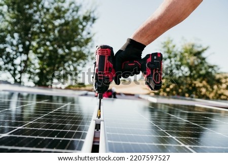 Similar – Foto Bild Unerkennbarer Ingenieur am Solarpanel