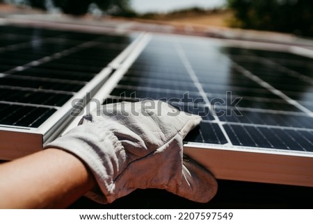 Similar – Foto Bild Unerkennbarer Ingenieur am Solarpanel