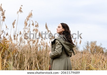 Similar – Image, Stock Photo Woman in the reeds Life