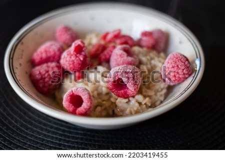 Similar – Image, Stock Photo Hot porridge with frozen blueberries