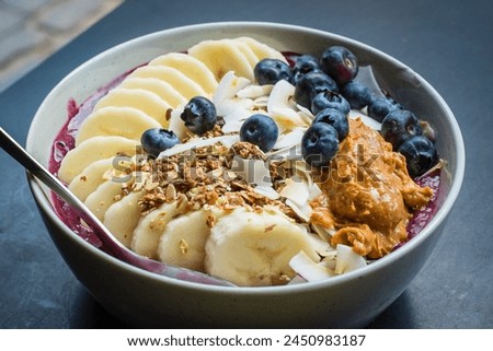 Similar – Image, Stock Photo Smoothie bowl with fresh berries and sesame served on table