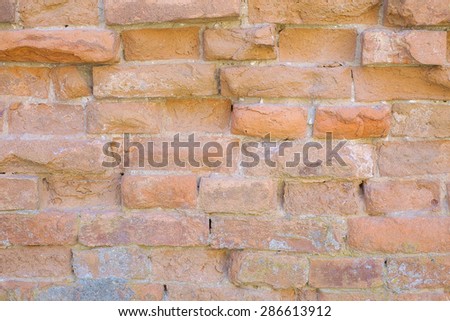 red brick wall texture grunge background with vignetted corners to interior design