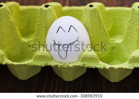 egg drawing, face with sticked out tongue