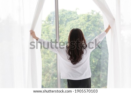 Similar – Foto Bild Frau am Fenster