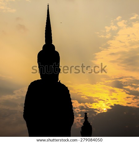 Silhouette, Image of Buddha  at Sala Keoku Park,  Nong Khai, Thailand.