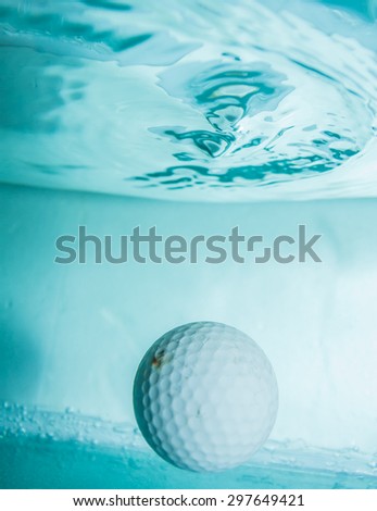 Golf ball in the water for background.
