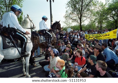 WASHINGTON, DC - APRIL 16: Riot police are positioned to confront protesters during World Bank and IMF meetings on April 16, 2000 in Washington, D.C.