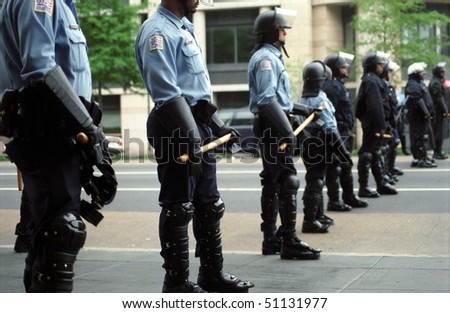 WASHINGTON, DC - APRIL 16: Riot police are positioned to confront protesters during World Bank and IMF meetings on April 16, 2000 in Washington DC