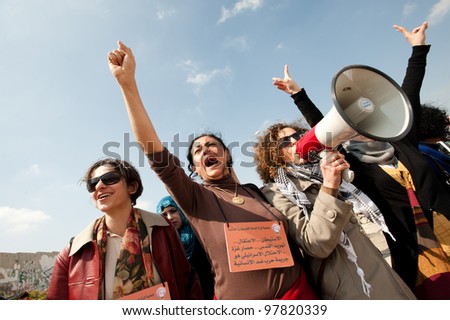 KALANDIA, OCCUPIED PALESTINIAN TERRITORIES - MARCH 8: Palestinian women, Israeli, and international solidarity activsits march to protest the Israeli occupation on International Women\'s Day 2012.