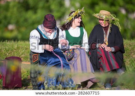KLAIPEDA, LITHUANIA - 24 JUNE 2014: Saint Jonas\' or Dew Holiday Festival (Rasos, Jonines, Kupole) is a midsummer folk festival celebrated on June 24 all around Lithuania.