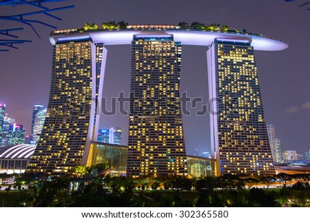 SINGAPORE CITY, SINGAPORE STATE - 29 OCTOBER 2014: Marina Bay Sands is a Resort fronting Marina Bay in Singapore. Developed by Las Vegas Sands, it is the most expensive standalone casino property