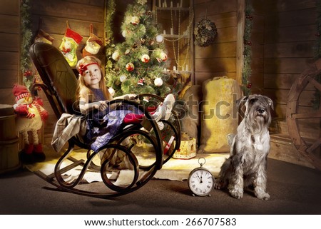 Photo of red-haired girl in a Christmas interior