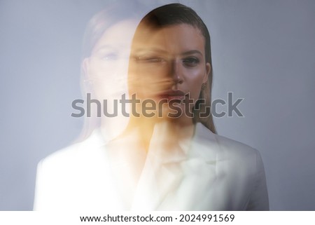 Similar – Image, Stock Photo blurred woman with an umbrella in rainy days in Bilbao city, Spain