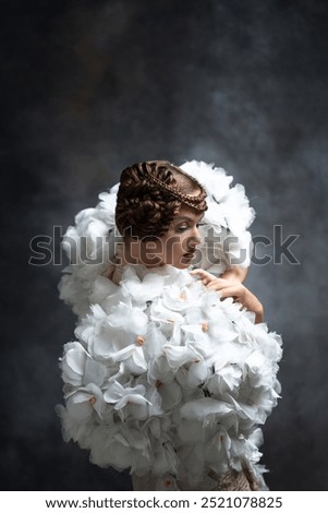 Similar – Foto Bild Mode Foto der schönen Braut mit blonden Haaren in eleganten Hochzeitskleid im Zimmer in der Hochzeit Morgen