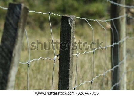 Post, fence, wire. Halswell Quarry, Christchurch, New Zealand