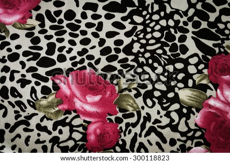 Texture fabric of leopard and rose for background