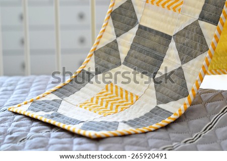 Patchwork/quilt table runner in gray, yellow and white