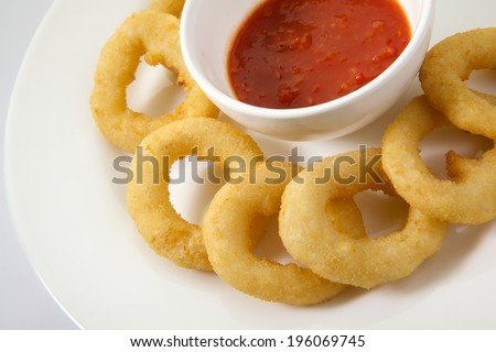 Appetizing Thick Cut Onion Rings isolated on white background