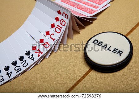 Cards for game in poker. Cards on a table for game in poker. A fan from cards. Dealer place