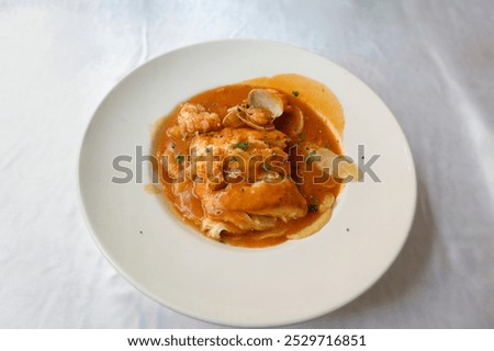 Similar – Foto Bild Seehechtfisch und Muscheln mit grüner Sauce