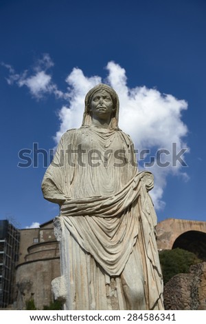 woman sculpture in the temple of the Vestals in the Imperial Forum in Rome