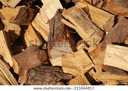 Brown yellow wood stocks, wood blocks. Wood stamps for heating, firing. Tree texture, wood texture background.