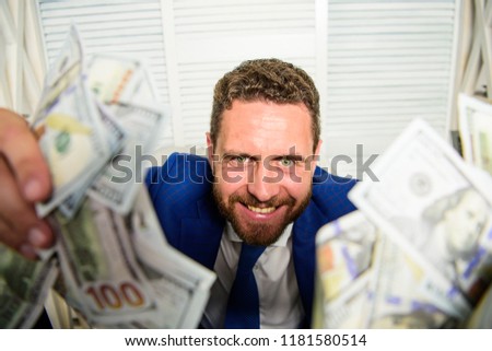 Che k out my profit this month. Earn money easy business tips. Man cheerful happy businessman with pile dollar banknotes. Profit and richness concept. Businessman formal suit hold cash dollars hands. Stock foto © 