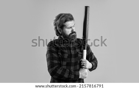 man swung the bat. bandit gang and conflict. sport. street hooligan with bat. man reliving stress. emotion control concept. brutal bearded man using baseball bat for fighting. hold a punch Сток-фото © 