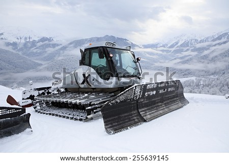 Sochi, Russia - February 10, 2015: Plow snow removal equipment in the mountains of Roza Khutor Resort in Sochi.