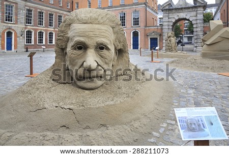 Dublin, Ireland - August 20, 2014: Sculpture Einstein and the theory of black hole. Exhibition of sand sculptures in the Upper Yard Dublin Castle.
