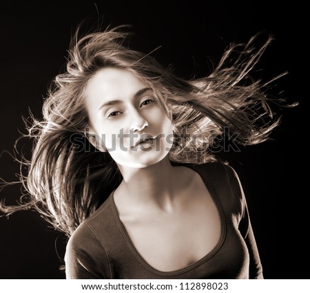 Portrait Of A Beautiful Young Woman With Hair Flying Stock Photo ...