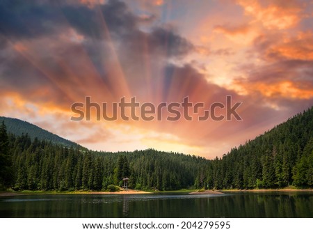 Sunset on Sinevir lake. Volcanic lake in the Carpathian Mountains. Ukraine, Europe