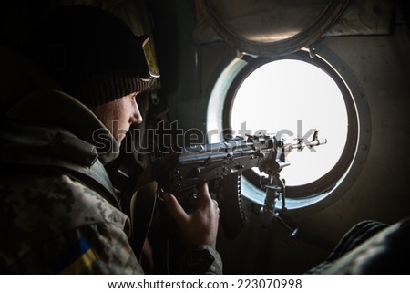 DONETSK REGION, UKRAINE - Oct 10, 2014: Ukrainian army helicopter patrols the area of of the antiterrorist operation in the Donetsk region