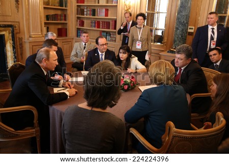 MILAN, ITALY - Oct 17, 2014: President Ukraine Poroshenko, German Chancellor Merkel, French President Hollande and Russian President Putin during a meeting on ASEM summit of European and Asian leaders