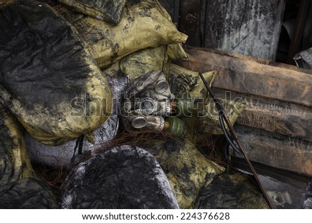 KIEV, UKRAINE - Feb 12, 2014: Mass anti-government protests in the center of Kiev. Barricades, ruin and chaos on Hrushevskoho St. Masks on the positions on the barricades