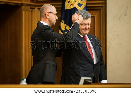 KIEV, UKRAINE - NOV 27, 2014: Ukrainian Prime Minister Arseniy Yatsenyuk and President of Ukraine Petro Poroshenko at the opening of the first session of the Verkhovna Rada of Ukraine VIII convocation