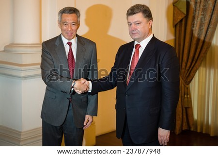 SINGAPORE - DECEMBER 9, 2014: President of Ukraine Petro Poroshenko and Prime Minister of Singapore Lee Hsien Loong during an official meeting during his working visit to the Republic of Singapore