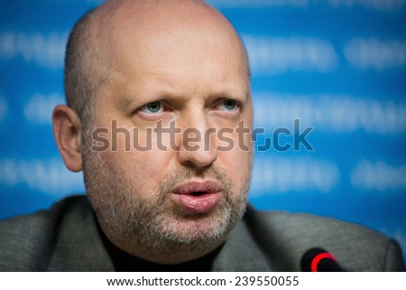KIEV, UKRAINE  - DECEMBER 20, 2014: Secretary of the National Security and Defence Council of Ukraine Oleksandr Turchynov holds a breefing after ending of a meeting of NSDC