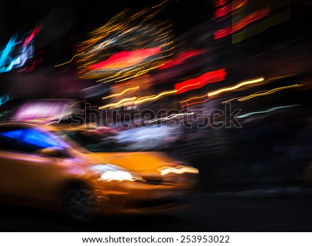 Illumination and night lights in New York City. Image in motion blur style.