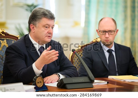 KIEV, UKRAINE - Jun 03, 2015: President of Ukraine Petro Poroshenko and the Prime Minister of Ukraine Arseniy Yatsenyuk during a meeting of the National Council of the reforms in Kiev