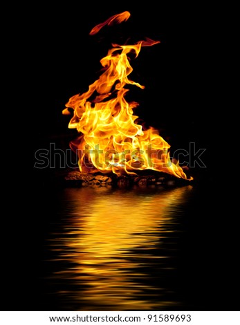Tongues of flame and water reflection. Isolated over black.