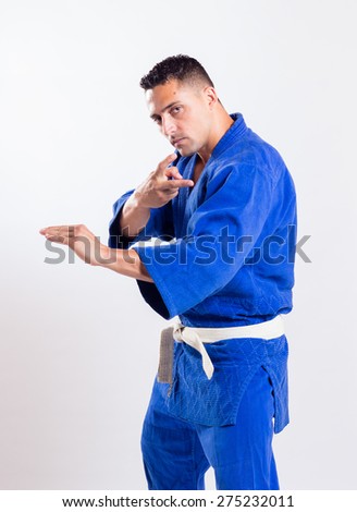 karate teacher on gray background
