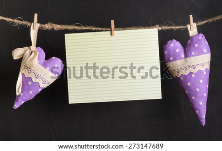 message card with handmade hearts of the cloth with polka dots on a rope with clothespins, greeting and love concept,  happy birthday, Congratulations on March 8, happy father\'s day, mother\'s day