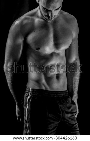 Fitness male body in black and white