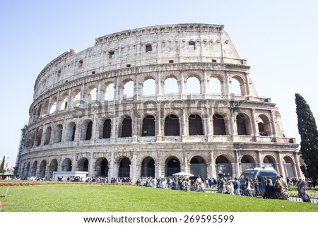 ROME, ITALY - APRIL 12: Wide view of the elliptical amphitheatre Colosseum, symbol of Roman Empire, on April, 12, 2015 in Rome, Italy. It was included among the New Seven Wonders of the World.