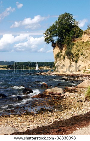 Small sailboat in front of the cliffs on the RÃ¼gen island