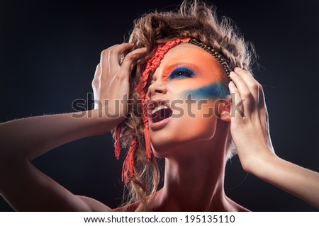 beautiful and graceful woman with painted underwear on her face, body painting