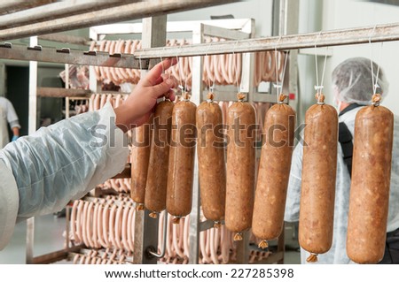 Lots of traditional sausage hanging in the warehouse