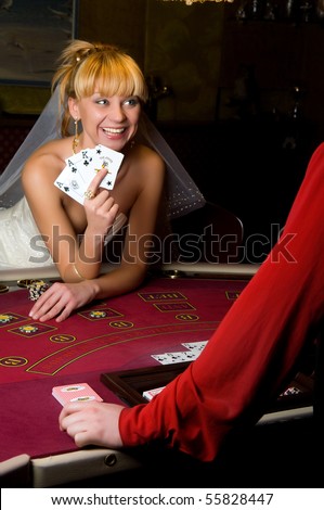 young woman in a wedding dress in casino
